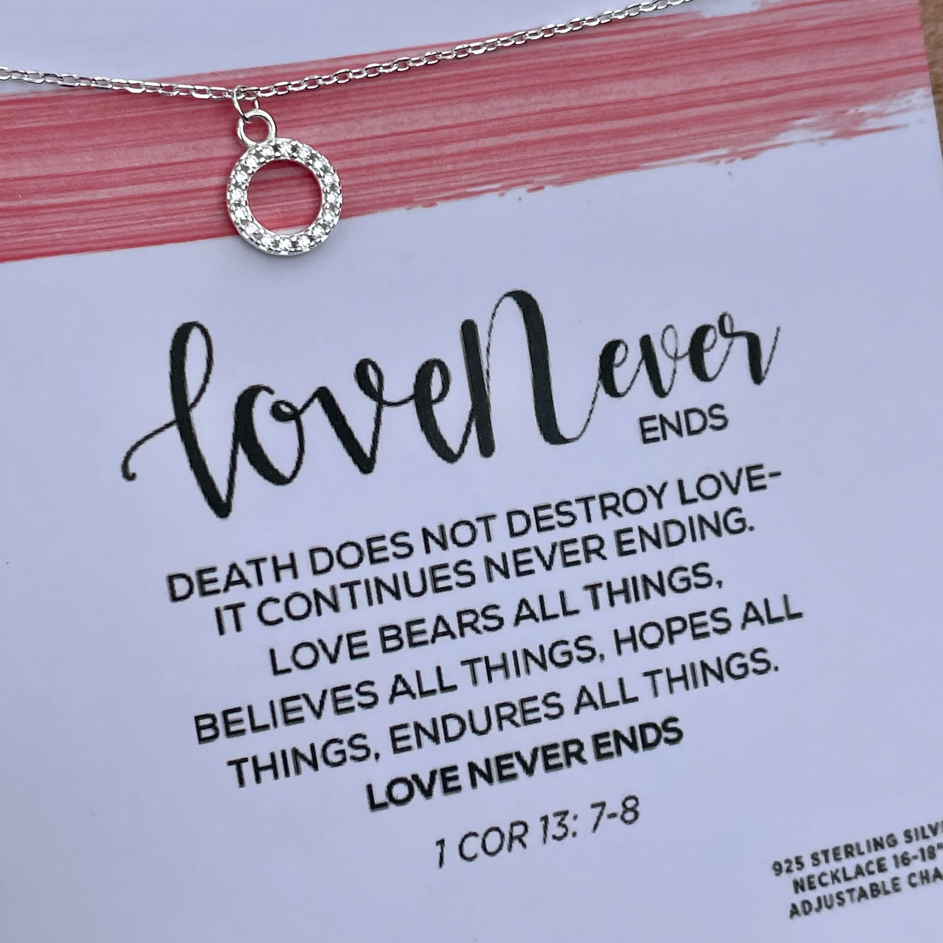 love never ends necklace