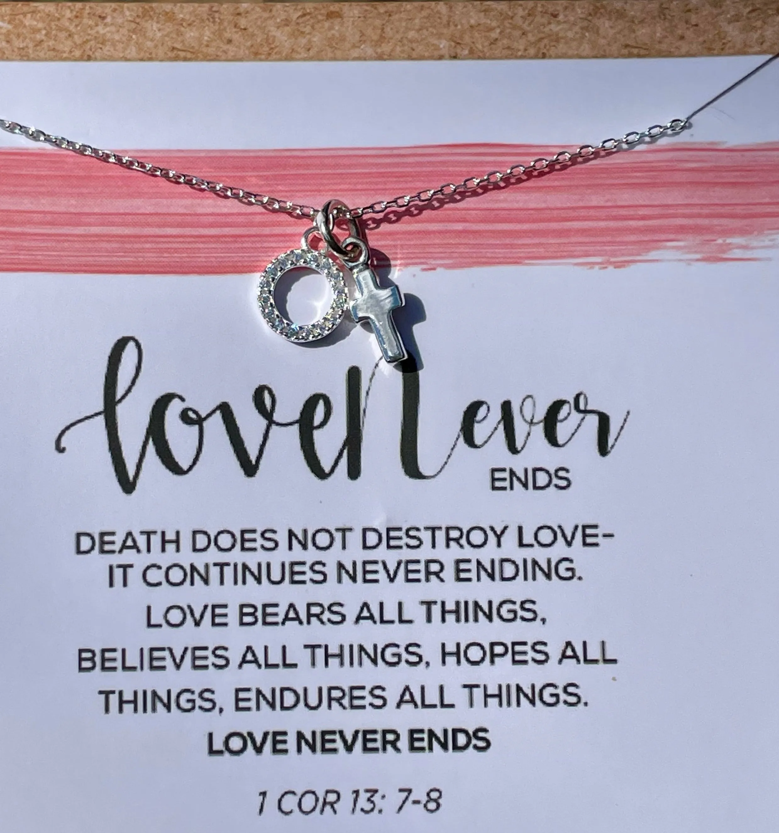 love never ends necklace