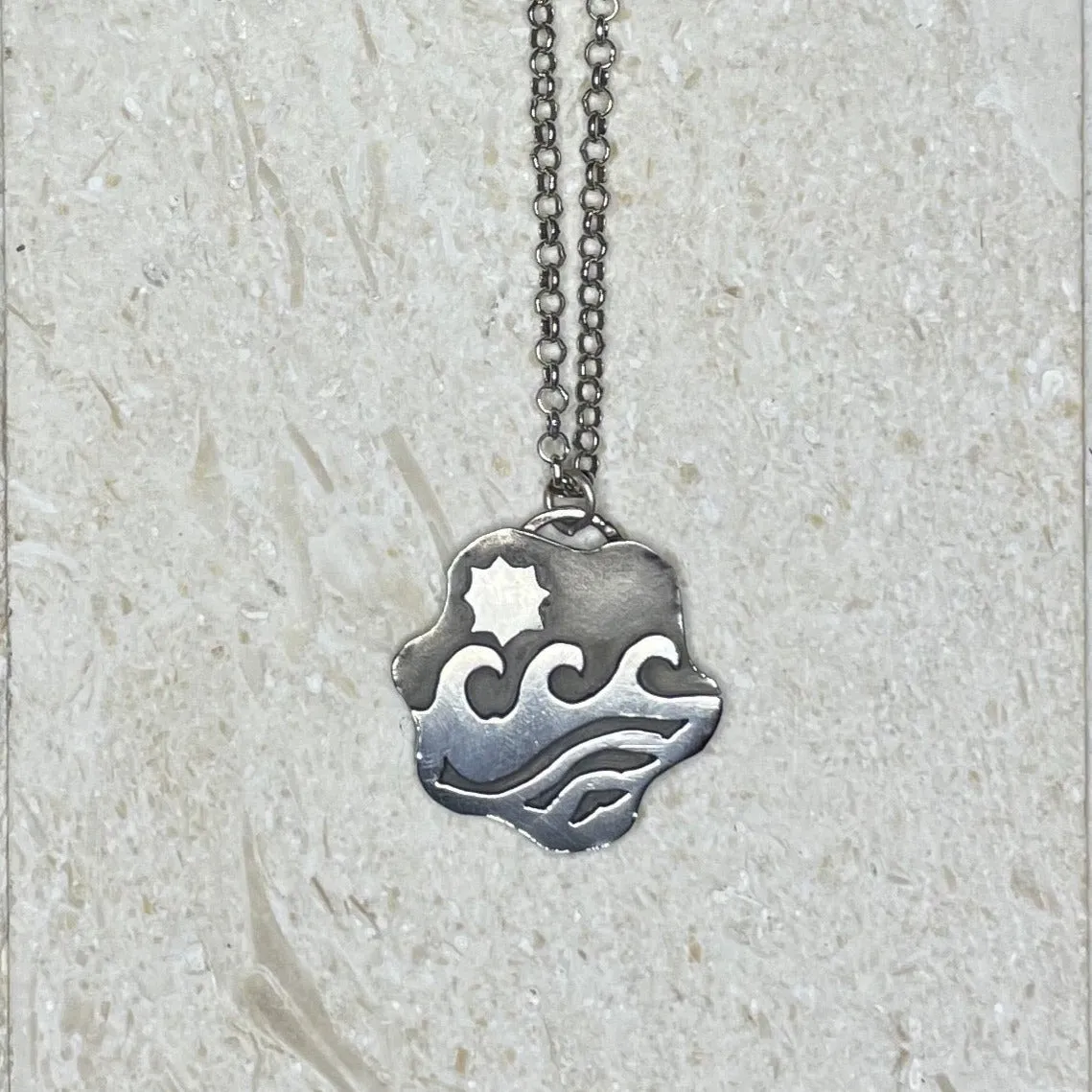 N19- Sterling Silver Waves and Clouds Medallion