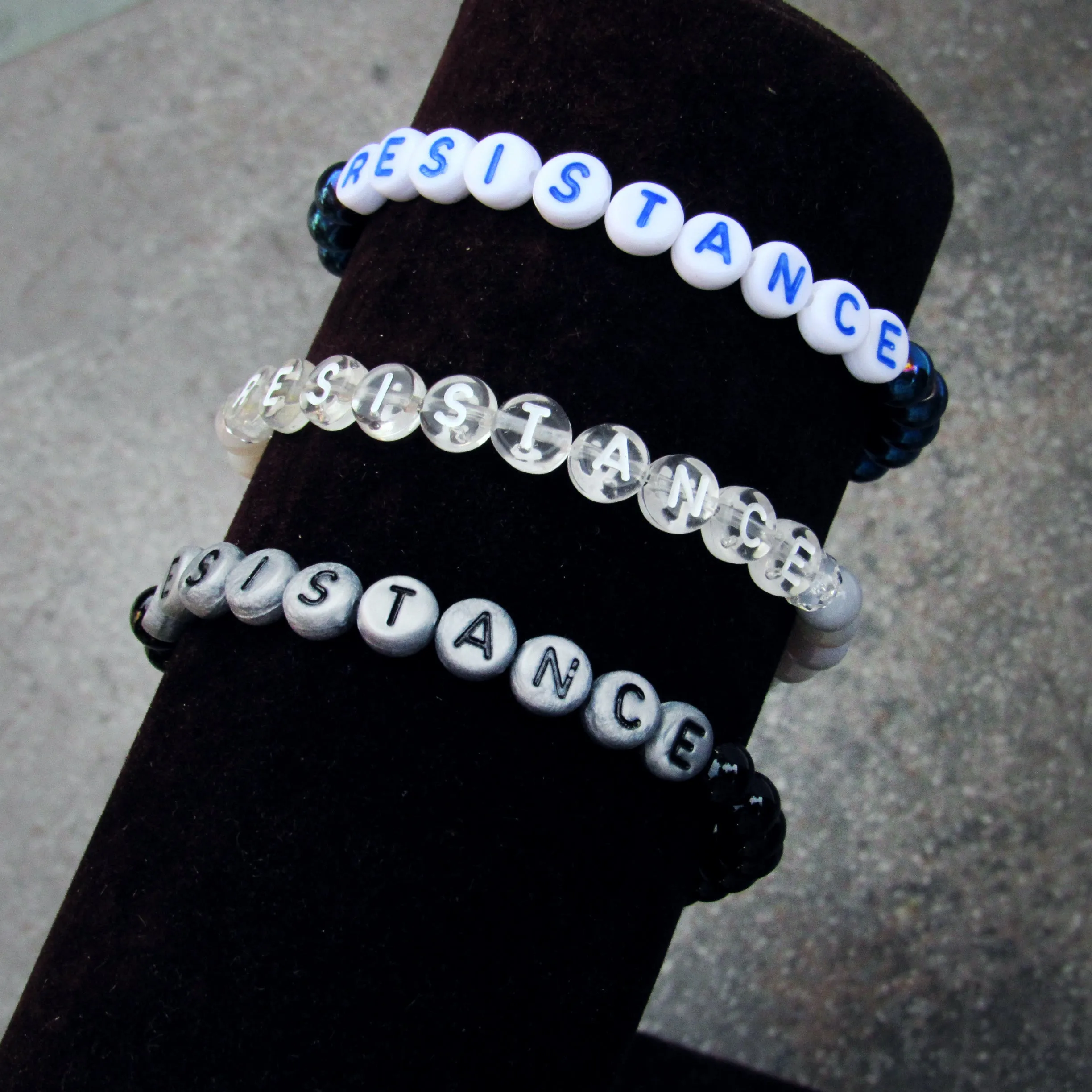 RESISTANCE bracelets in various sizes and gemstones